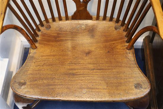 An early 19th century yew, ash and elm Windsor chair, W.2ft D.1ft 9in. H.3ft 5in.